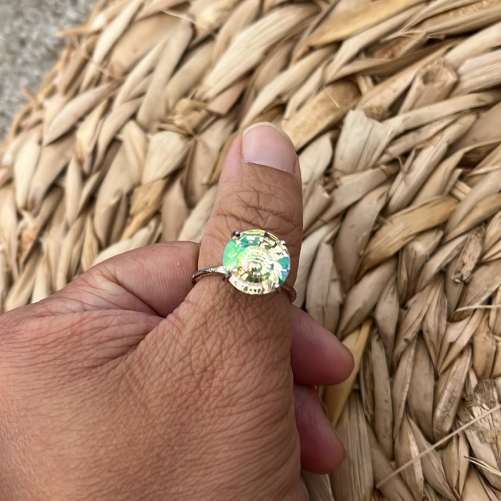 Swarovski crystal lumigreen flower ring with authenticity tag size 8
